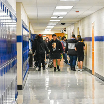 Group of students walking down hallway. Read about Gifts by Estate Note Group of students walking down hallway. Read about Gifts by Estate Note
