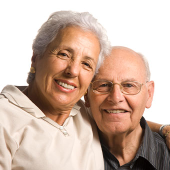 Older couple smiling at camera. Link to Life Stage Gift Planner Over Age 65 Situations.